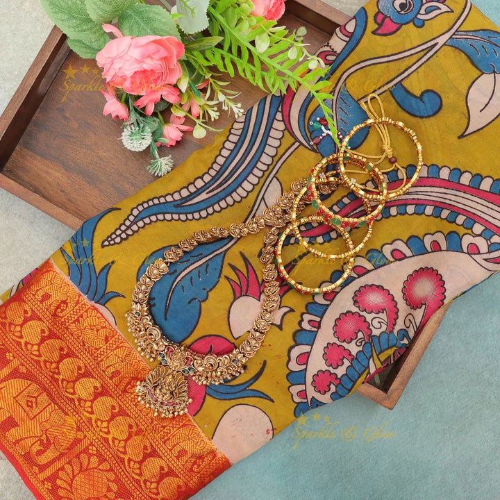 Exquisite Kalamkari Saree & Temple Jewellery Set