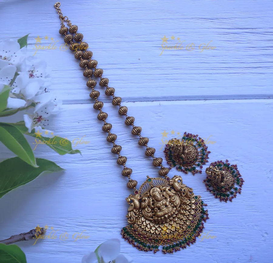 Gold alike polished lakshmi long necklace - Ruby Green - Sparkle and Glow