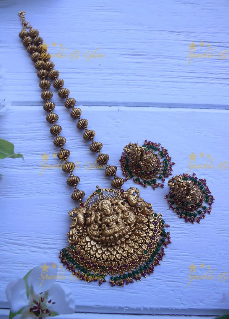 Gold alike polished lakshmi long necklace - Ruby Green - Sparkle and Glow