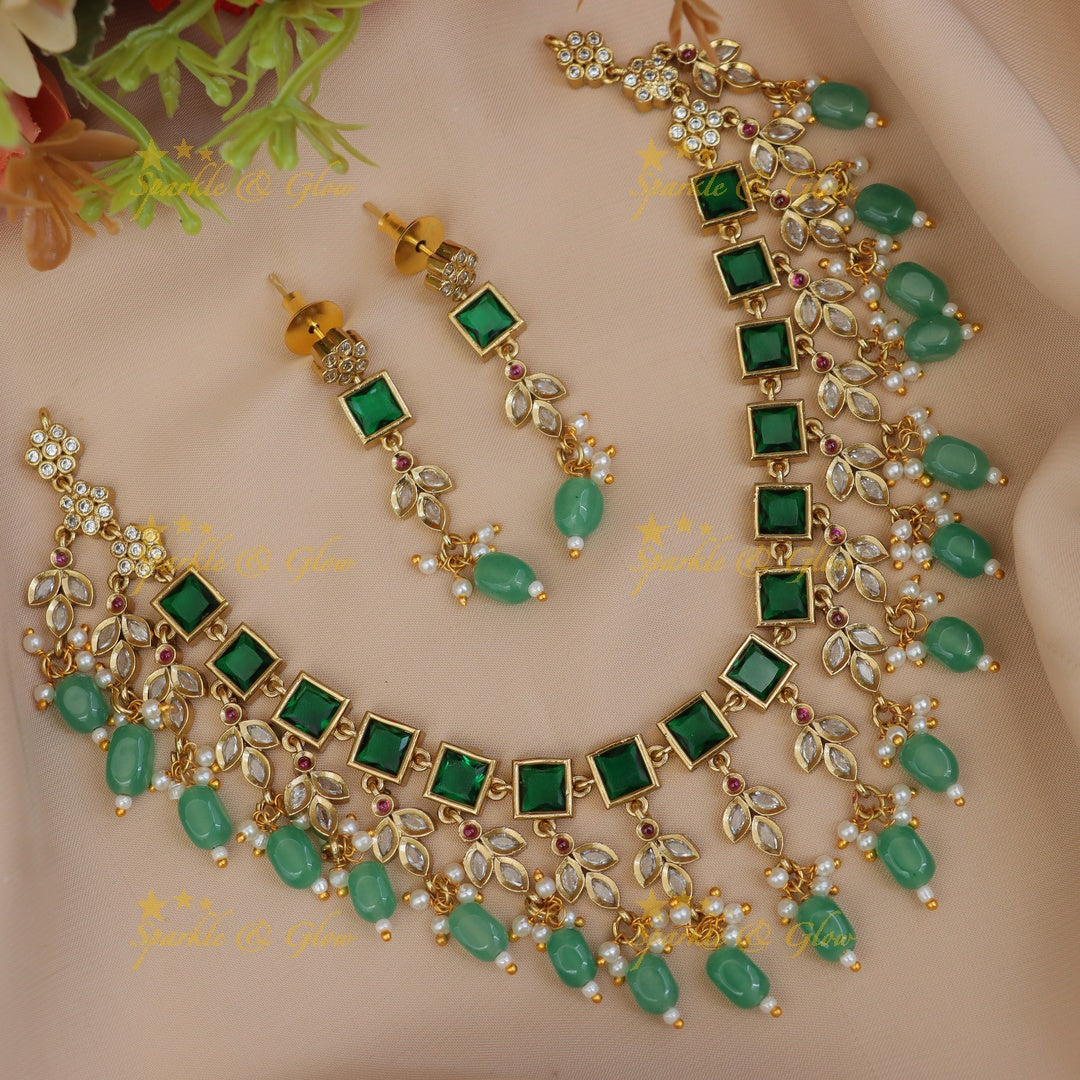 Exquisite Gold Necklace Set with Emerald Stones