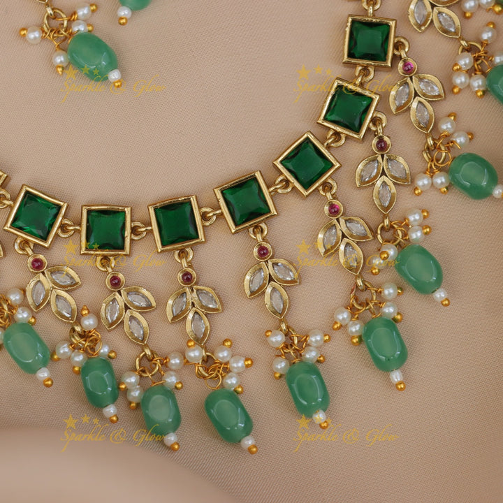 Exquisite Gold Necklace Set with Emerald Stones