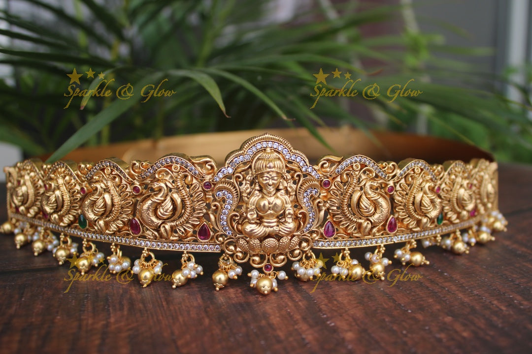 Gold alike polished Lakshmi and peacock design hipbelt