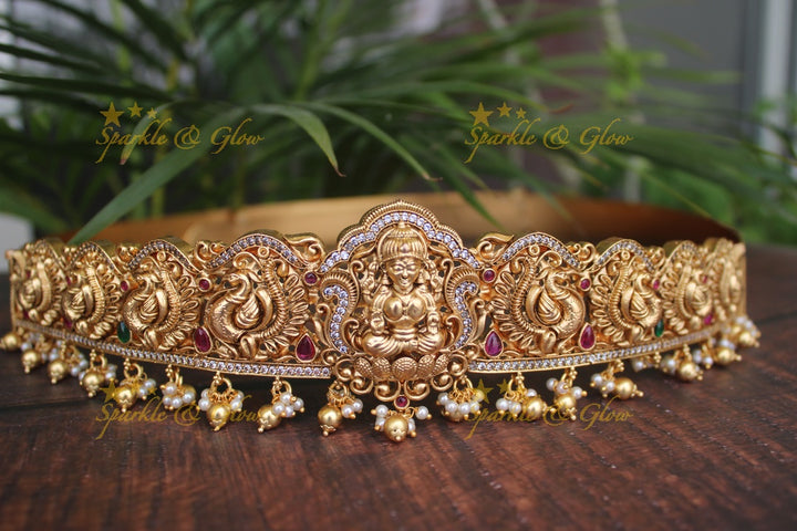 Gold alike polished Lakshmi and peacock design hipbelt