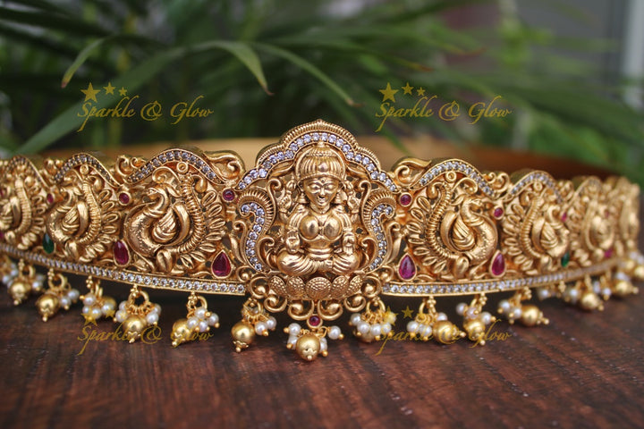 Gold alike polished Lakshmi and peacock design hipbelt