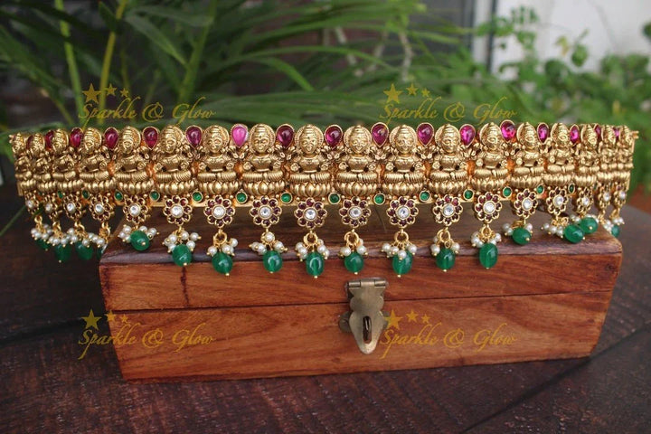 Gold alike polished Lakshmi hipbelt with flower design in bottom of the hipbelt - Gold - Sparkle and Glow