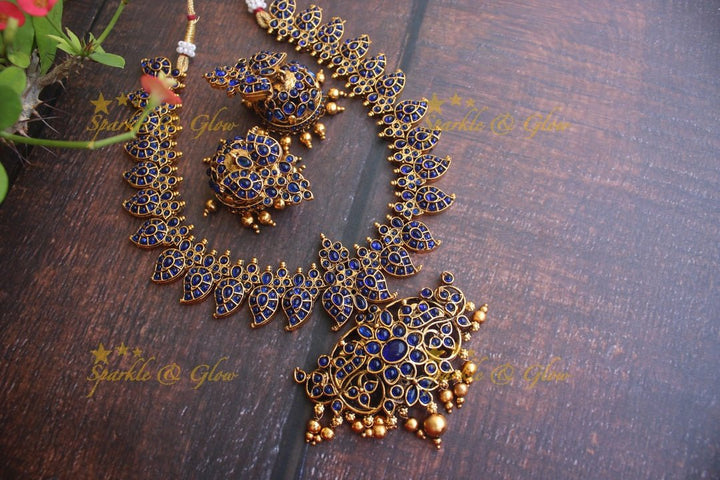 Gold alike polished kemp and cz stones mango necklace - White - Sparkle and Glow - Blue - Back Chain