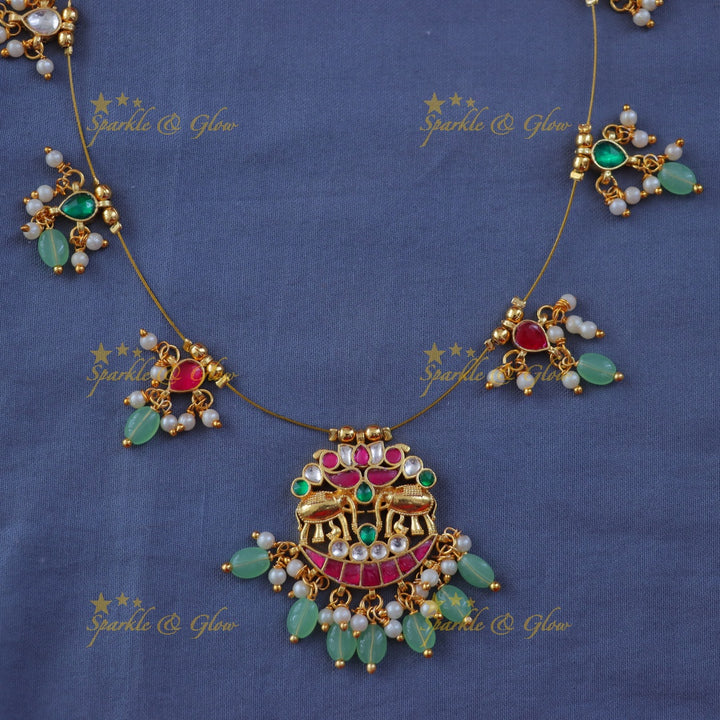 Elegant Festive Gold Elephant Pendant Necklace