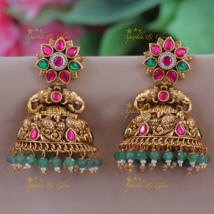 Dazzling Gold-Plated Peacock Jhumkas for Festive Glamour