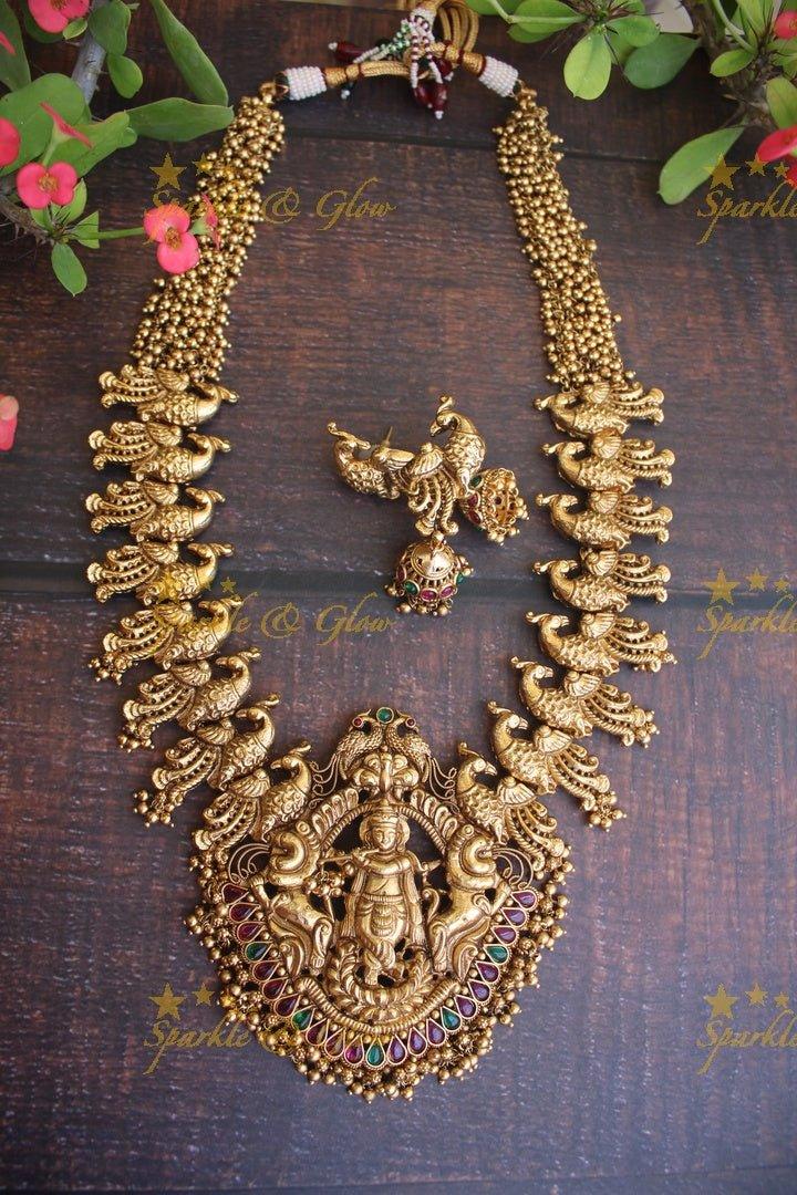 Gold alike polished Krishna Playing Flute peacock design haram - Sparkle and Glow