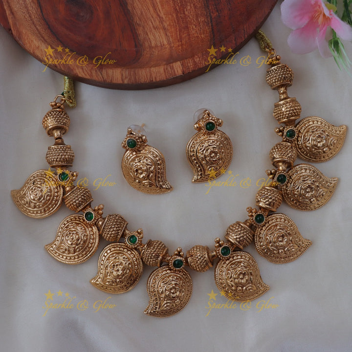 Budgeted Mango Floral Carved Gold Finish Short Necklace
