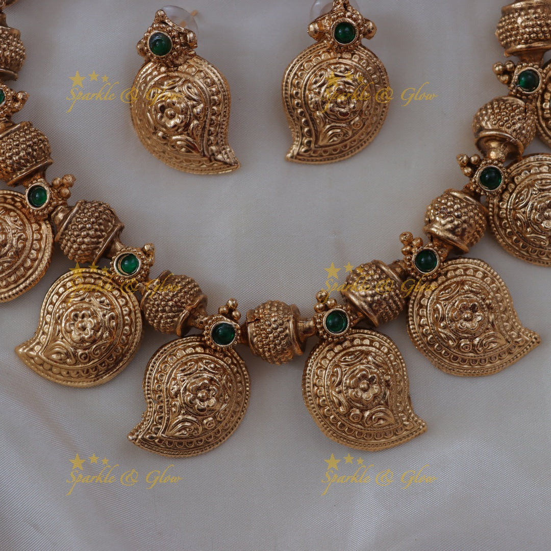 Budgeted Mango Floral Carved Gold Finish Short Necklace