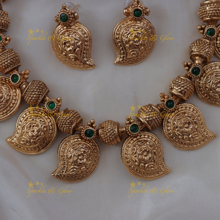 Budgeted Mango Floral Carved Gold Finish Short Necklace