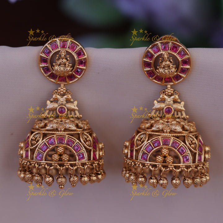 Festive Gold Peacock Jhumkas for Elegant Flair