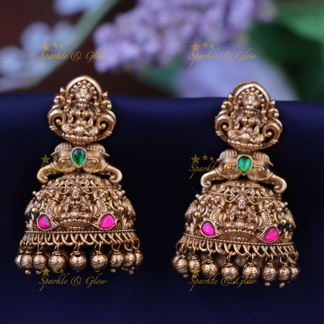 Exquisite Lakshmi Idol Gold Jhumka Earrings – New Arrival