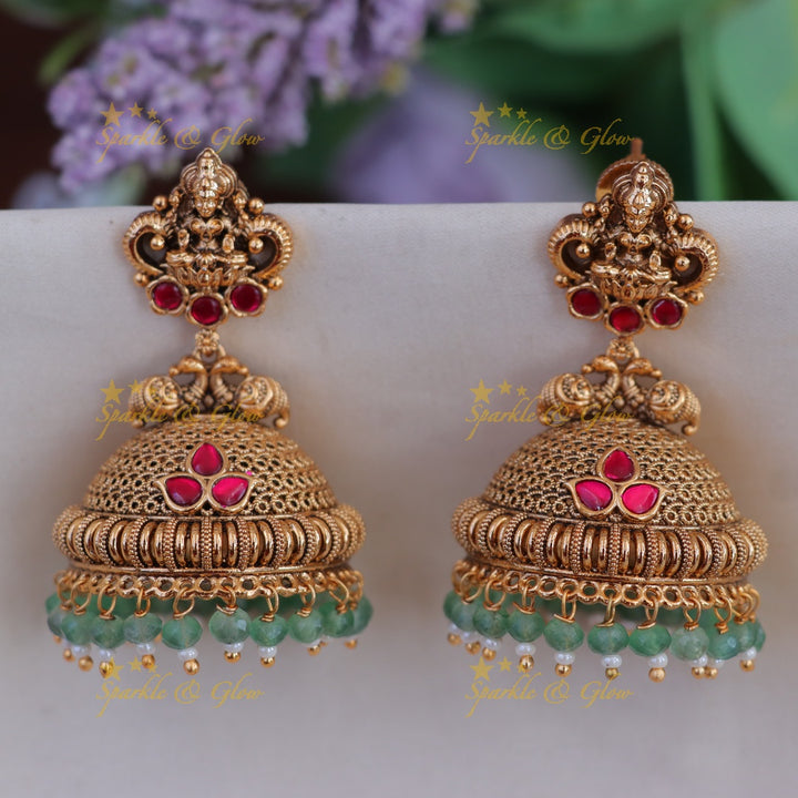 Elegant Lakshmi Peacock Jhumka Earrings - Shop Now