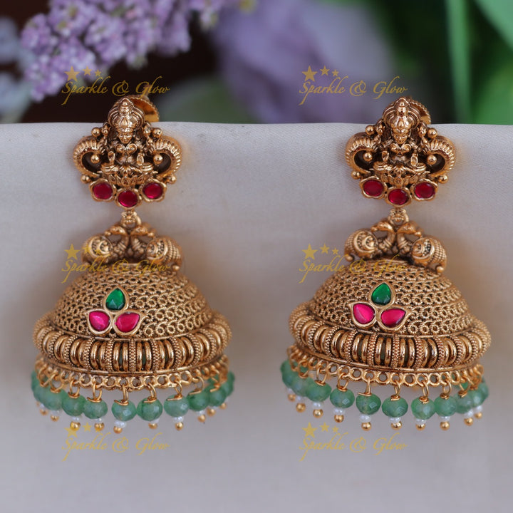 Elegant Lakshmi Peacock Jhumka Earrings - Shop Now