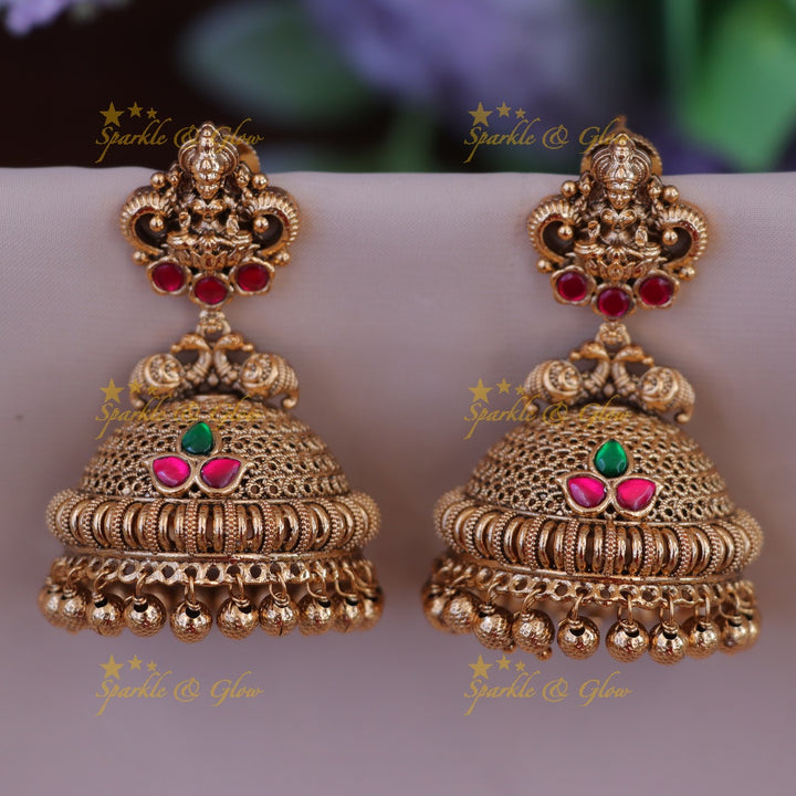 Elegant Lakshmi Peacock Jhumka Earrings - Shop Now