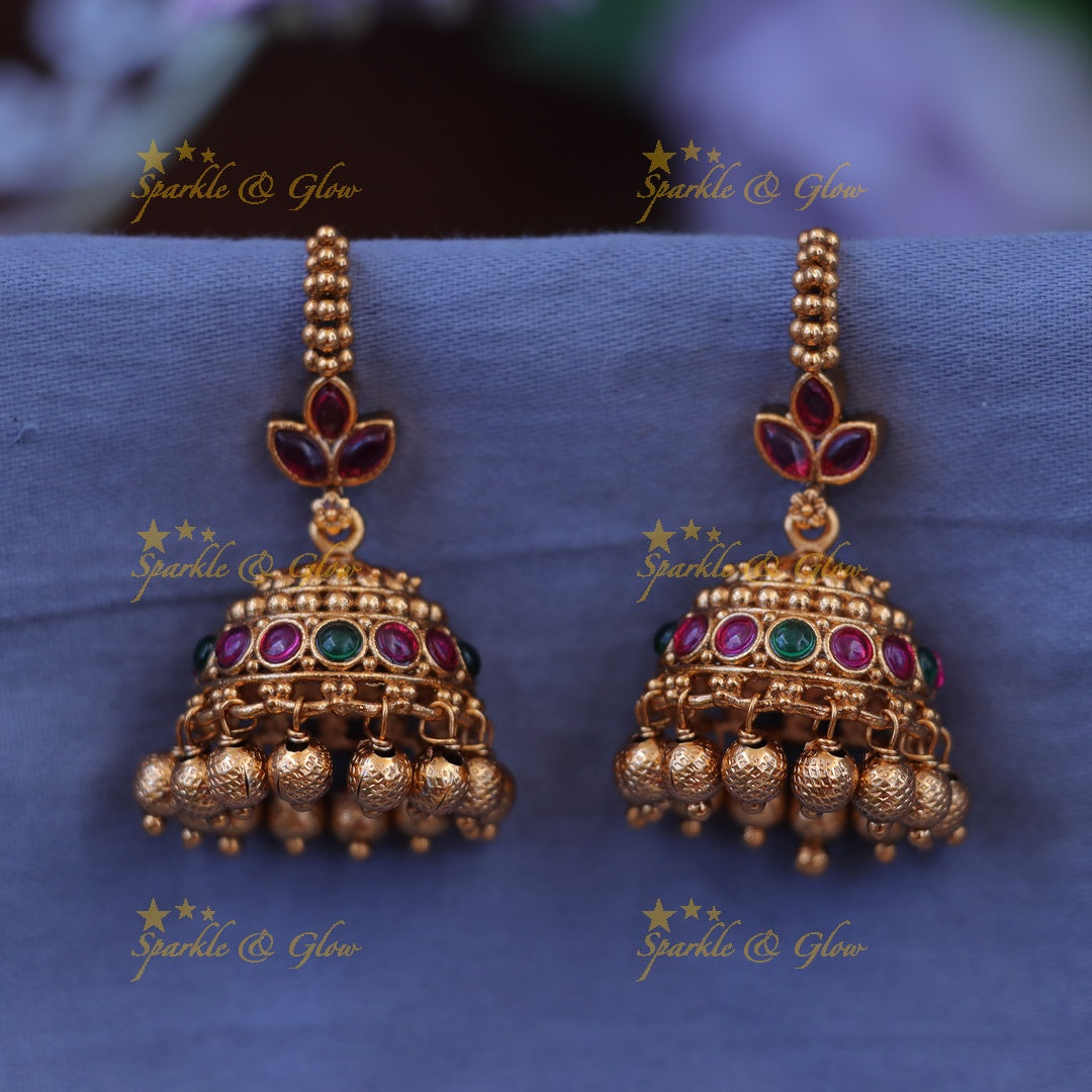 Glamorous Gold Jhumka Earrings for Luxurious Weddings