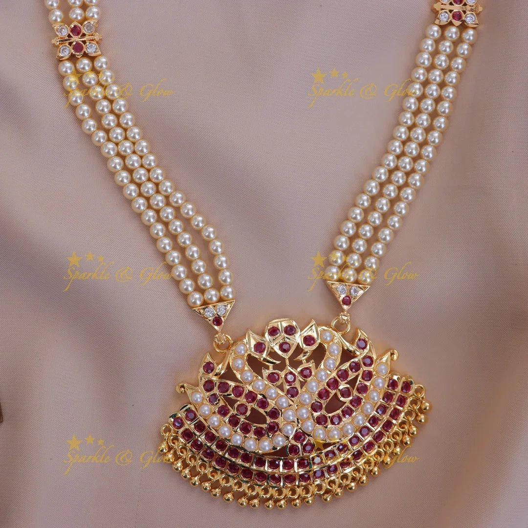 Exquisite Pearl Necklace with Regal Peacock Pendant