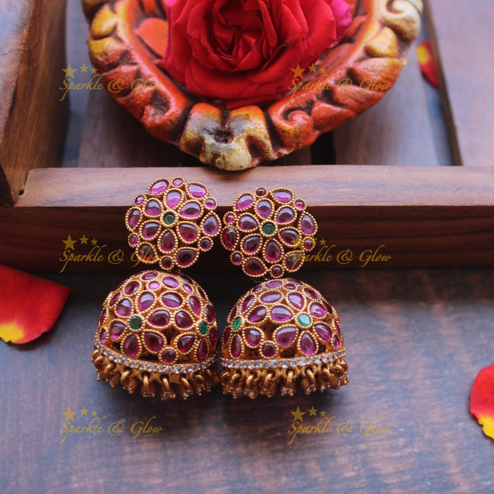 Gold alike kemp flower studded jhumukas