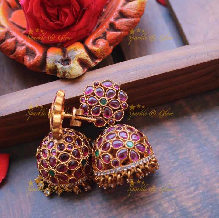 Gold alike kemp flower studded jhumukas