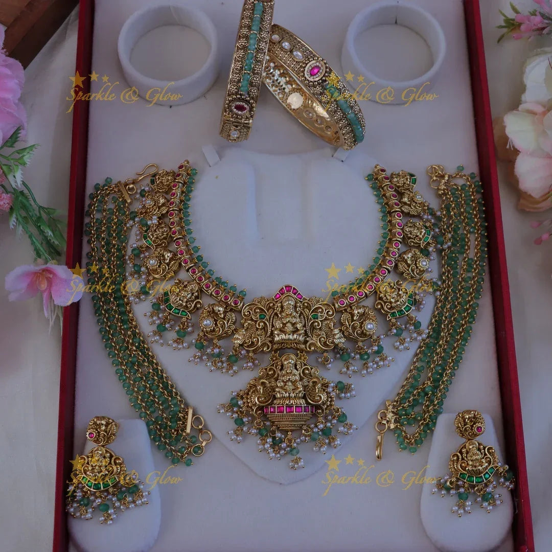 Exquisite Jadau Kundan Lakshmi Bridal Necklace Set