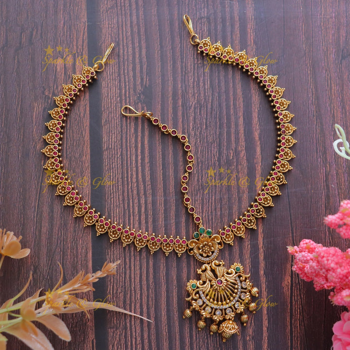 Mesmerizing Peacock Maang Tikka with Kemp Flowers