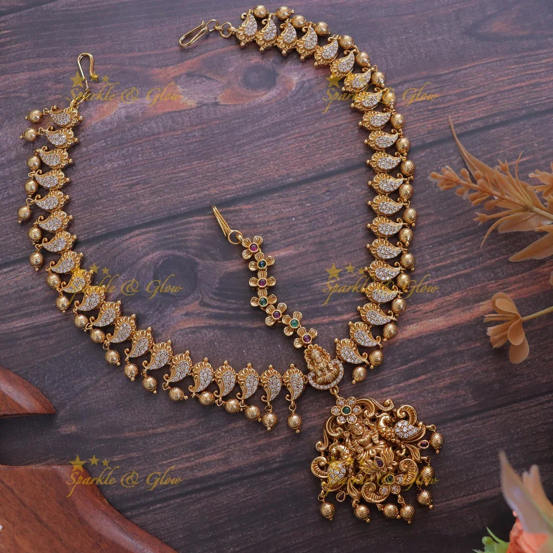 Elegant Lakshmi Peacock Maang Tikka - Sparkle & Glow
