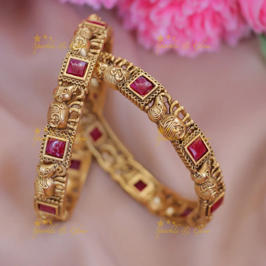Exquisite Gold Kemp Bangles with Intricate Elephant Motifs