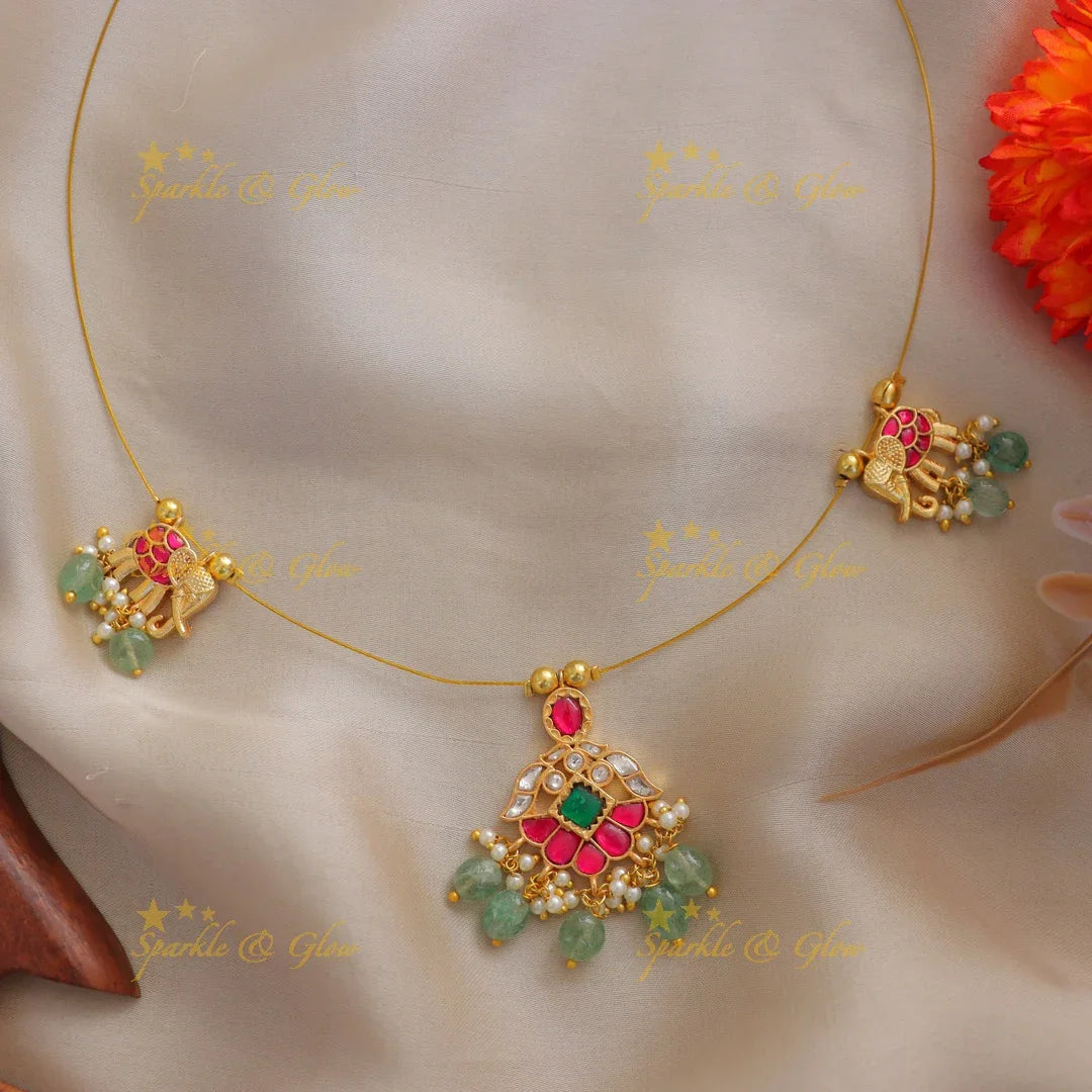 Gleaming Gold Floral Elephant Necklace - Festive Glamour