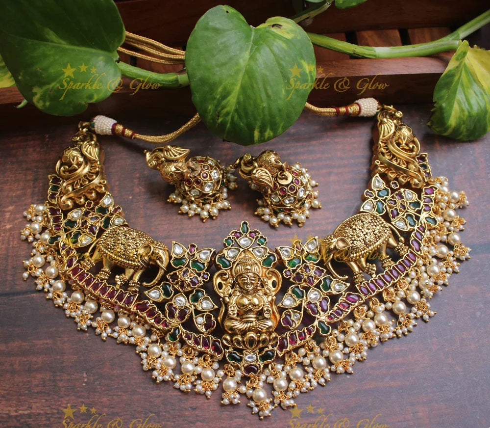 Exclusive silver replica Lakshmi intricate carved necklace in gold alike polish - Green Beads - Sparkle and Glow