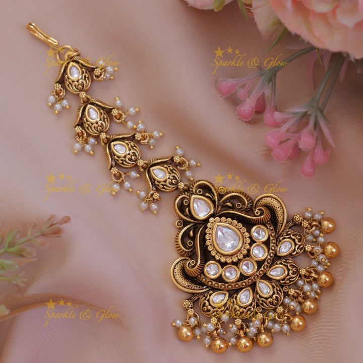 Exquisite Gold Maang Tikka for Special Celebrations