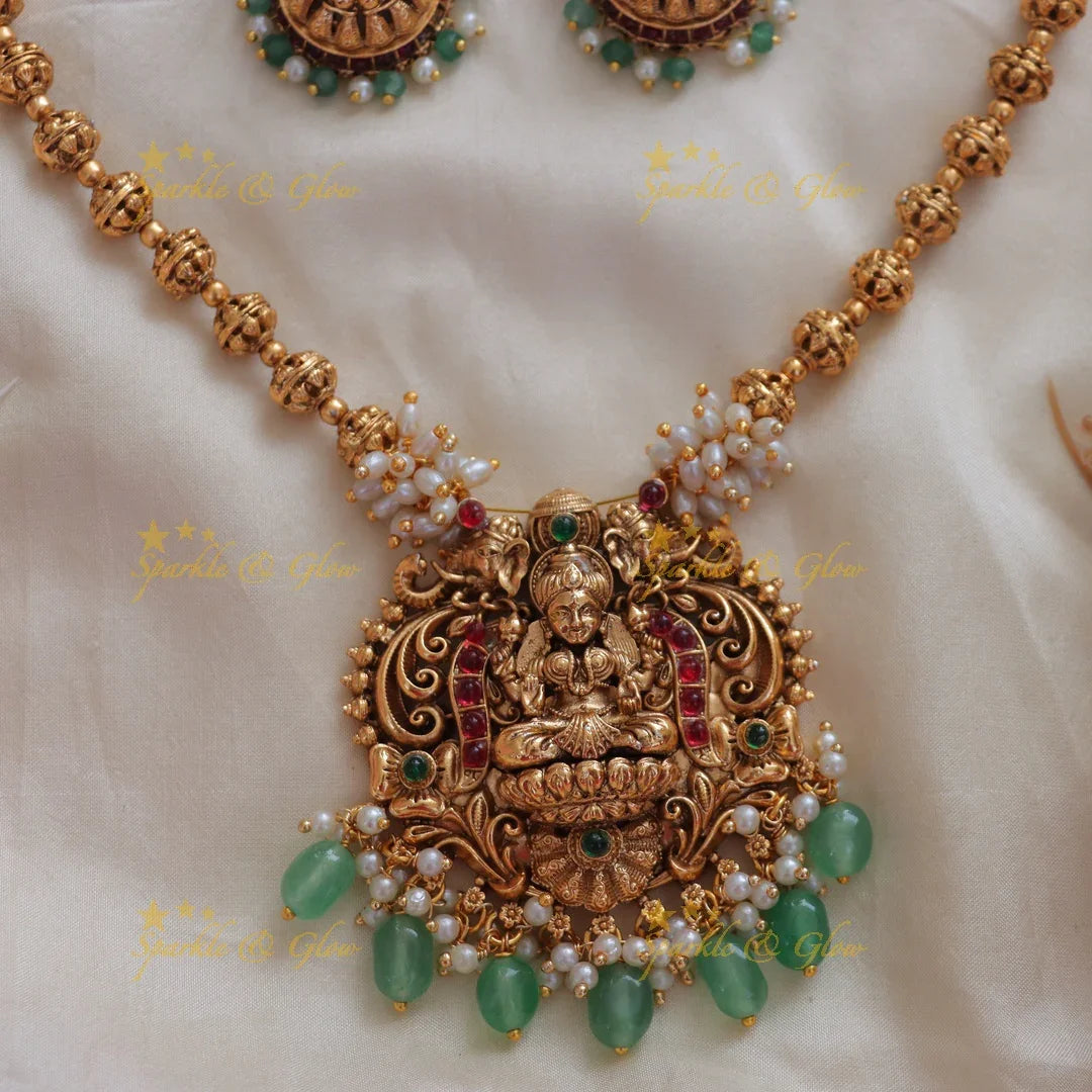 Exquisite Gold Beads Lakshmi Necklace - Festive Elegance