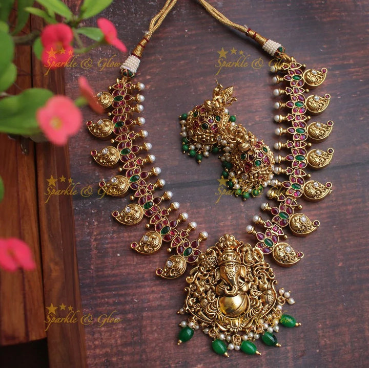 Gold alike Ganesha carved mango necklace - Sparkle and Glow