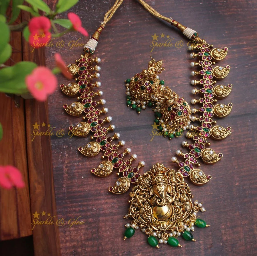 Gold alike Ganesha carved mango necklace - Sparkle and Glow