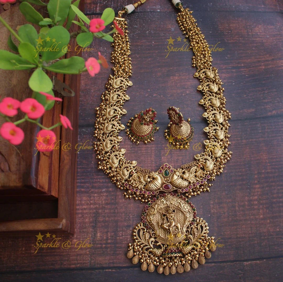Gold alike statement Krishna playing flute pendent peacock carved haram - Sparkle and Glow