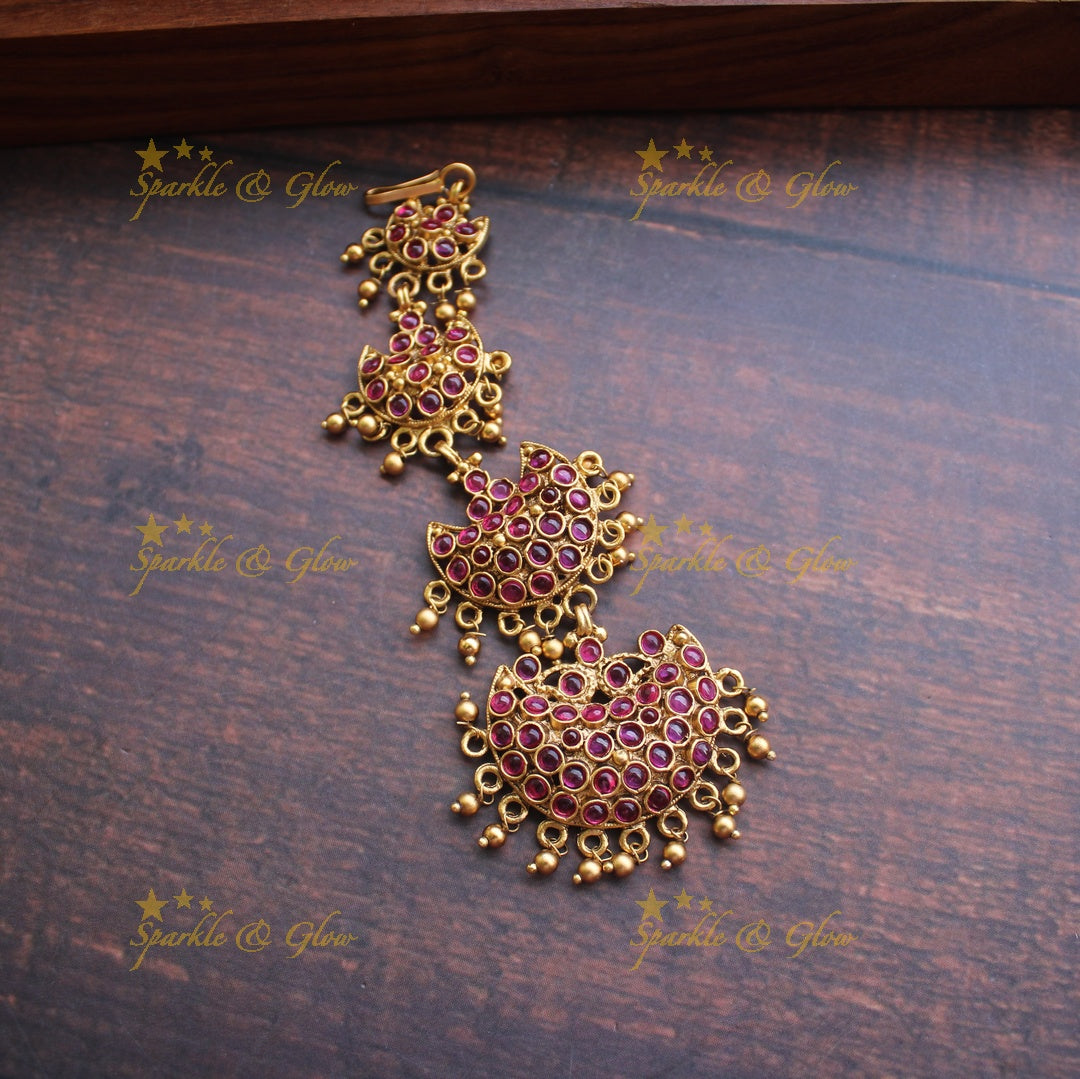 Gold alike polished half moon design maangthika with kemp stones