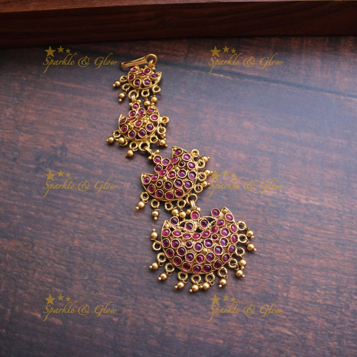 Gold alike polished half moon design maangthika with kemp stones