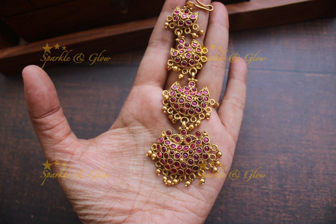 Gold alike polished half moon design maangthika with kemp stones