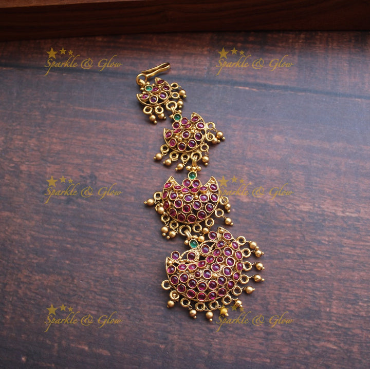 Gold alike polished half moon design maangthika with kemp stones