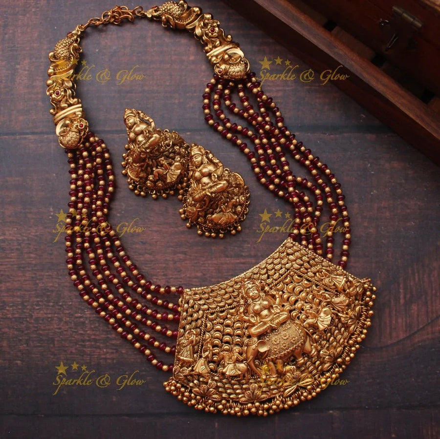 Gold alike intricate Lakshmi Bead necklace - Ruby - Sparkle and Glow