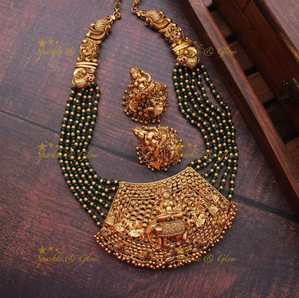 Gold alike intricate Lakshmi Bead necklace - Ruby - Sparkle and Glow