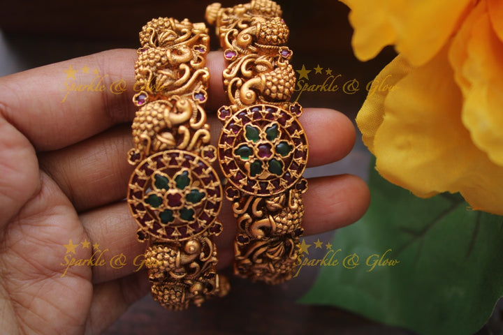 Gold alike intricate peacock bangles a pair