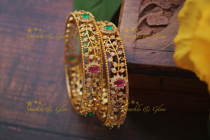 Gold alike AD stone bangles a pair