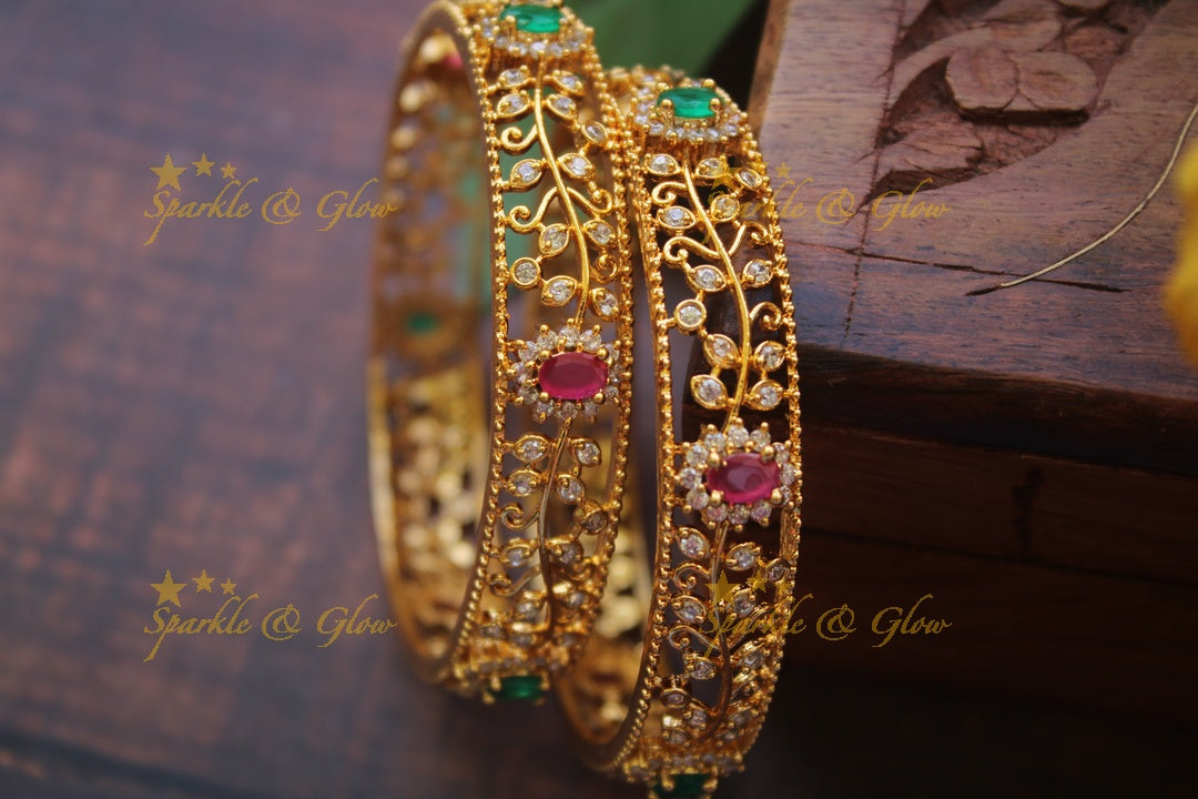 Gold alike AD stone bangles a pair