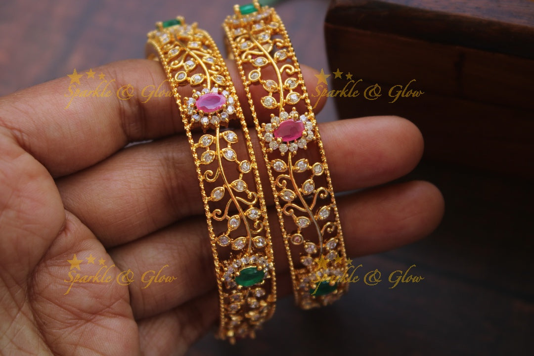 Gold alike AD stone bangles a pair