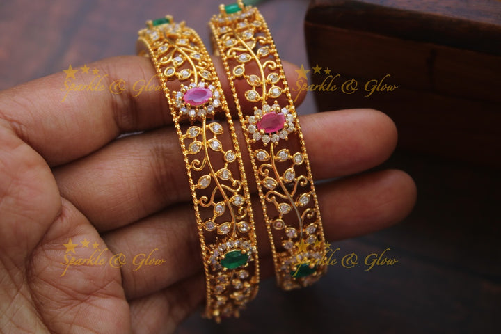 Gold alike AD stone bangles a pair