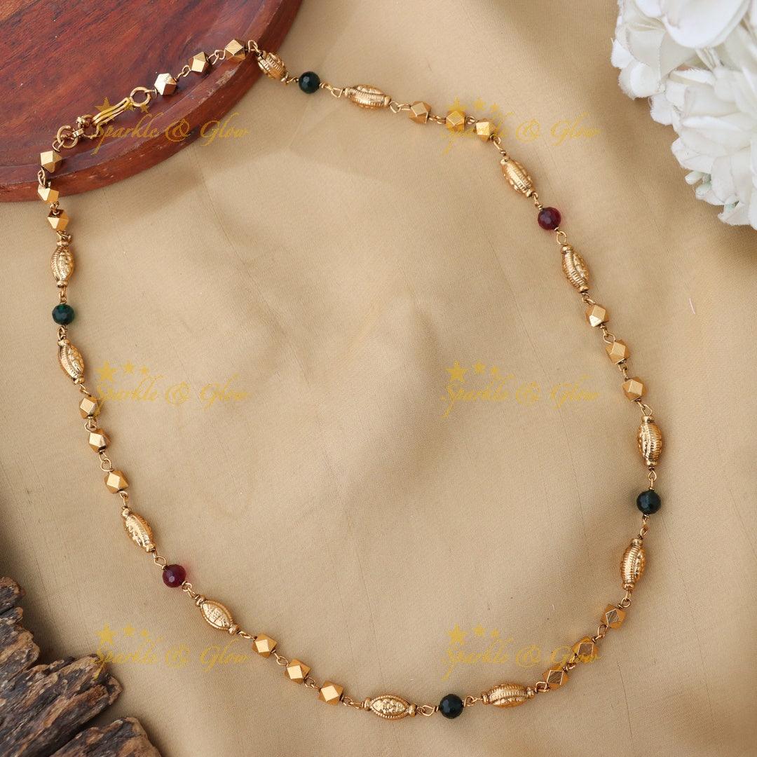 Elegant Beaded Necklace with Golden Charms