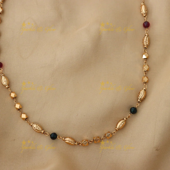 Elegant Beaded Necklace with Golden Charms