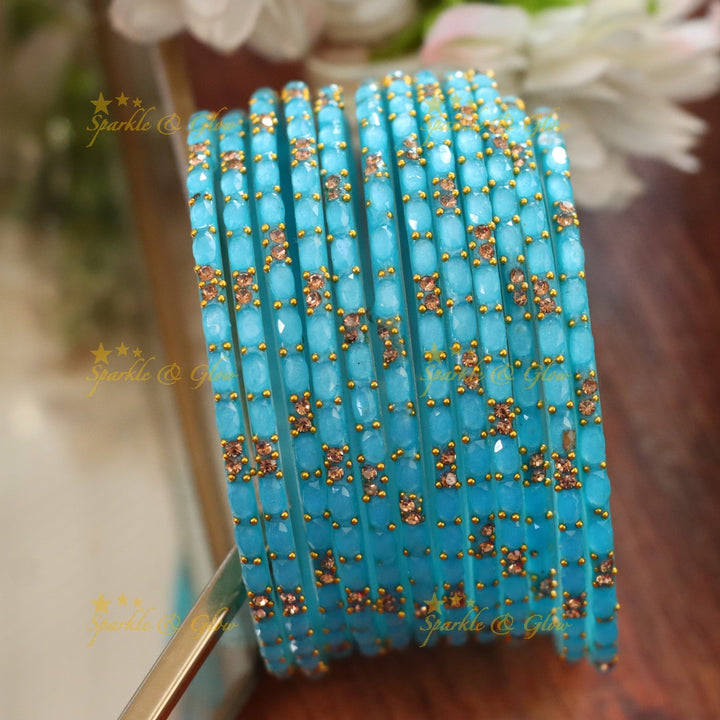 Exquisite White Glass Bangles with Gold Highlights